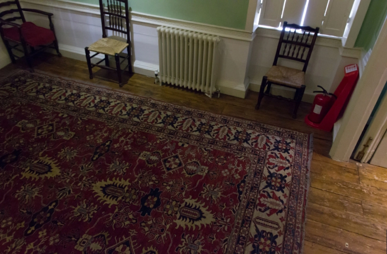 Original photograph: The rug, chairs, and wooden floor in Dr Johnson
