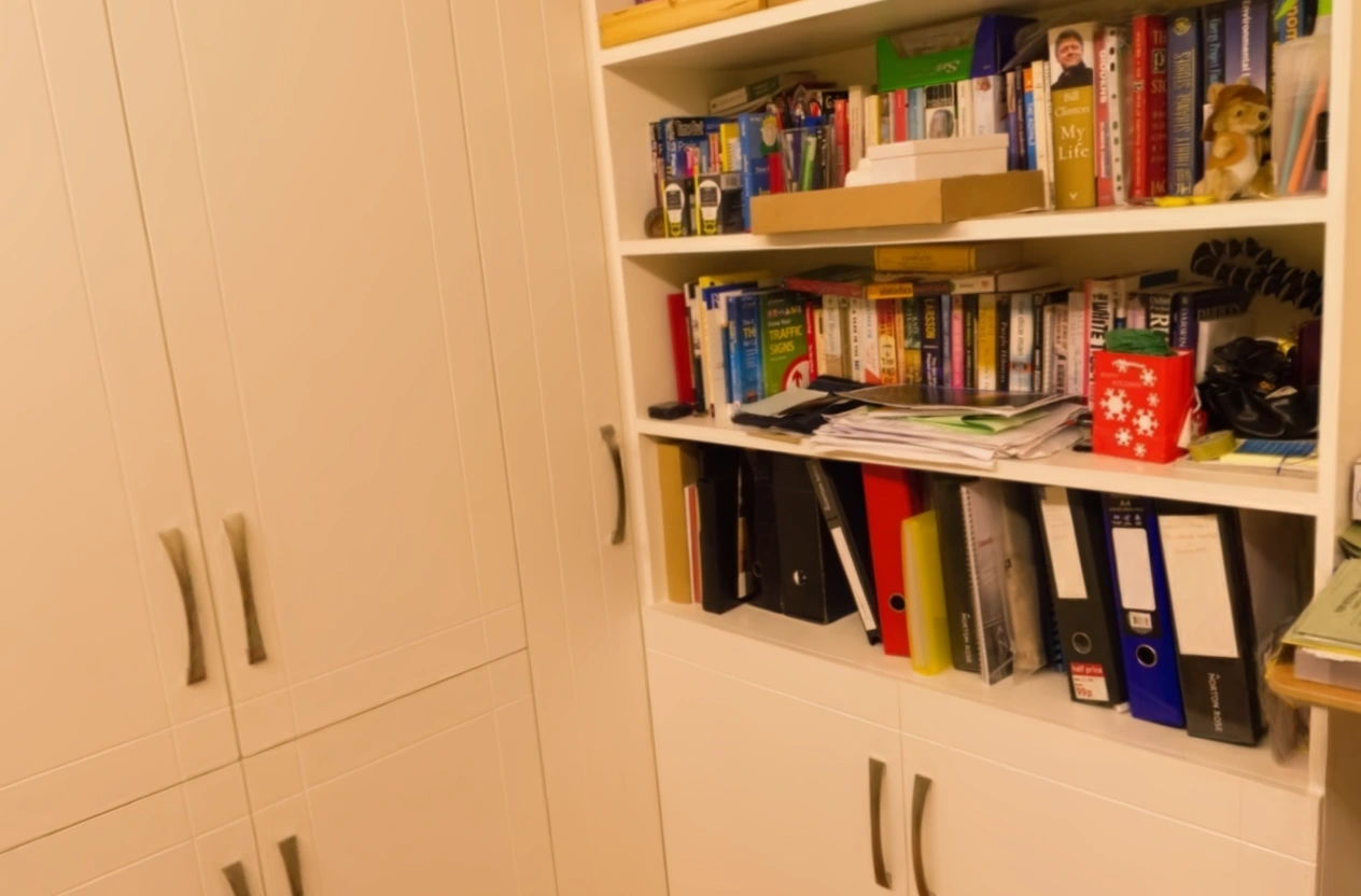 MakeWorlds render: Bookshelves, binders, and cupboard doors in Playroom
